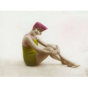  Girl in Bathing Costume and Head Scarf Poses Sitting on 