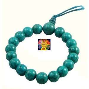   Beads Wrist Mala and a Copyrighted Tibetan Mantra Buddha Eye Magnet