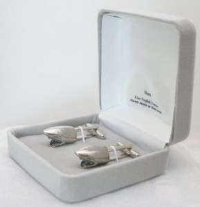 These cufflinks feature a detailed sharks head. They have been 