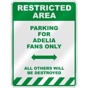   PARKING FOR ADELIA FANS ONLY  PARKING SIGN