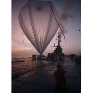  A Naval Hot Air Balloon Tugs at its Launch Pad on the USS 