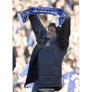  U.S. actor Stallone holds a scarf as he walks on the pitch 