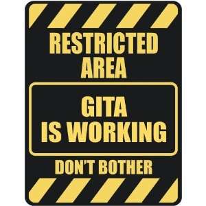   RESTRICTED AREA GITA IS WORKING  PARKING SIGN