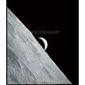 Apollo 17 image of a crescent earthrise over moon Framed Prints