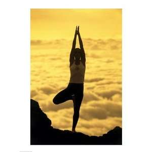 Silhouette of a young woman practicing yoga, Haleakala National Park 