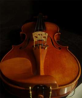 The package including A violin ,a bow and a foam square case.