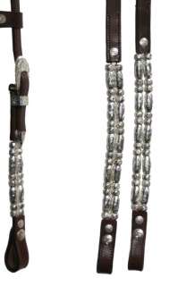 The reins are split and match the bridle with two rows of silver 
