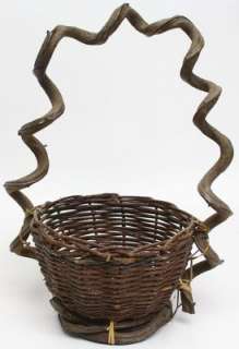Pre owned handmade basket is sturdily made from woven Georgia kudzu 