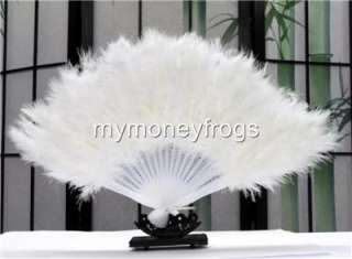 Today you are looking at a beautiful feather hand fan.