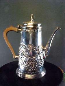 1730 American Coin Silver Repousse Coffeepot. Unusual Decoration