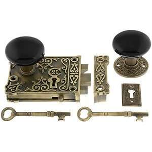   Antique. Antique Brass Ornate Rim Lock Set With Black Porcelain Door
