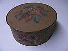 Antique Guildcraft metal container with flowered design. 7 1/2 across 