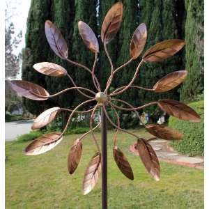   Copper Wind Sculpture Dual Headed Spinner   Spinning Ficus Leaves
