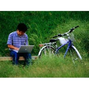  Man Using Laptop Computer Beside His Bicycle Near Kamogawa 