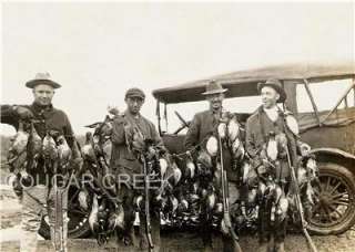Four Duck Hunters With All Their Ducks & Geese Infront Of Their Ford 