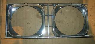 1973 CAPRICE HEADLIGHT BEZEL OR DOOR , NICE USED  