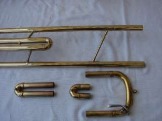 WE GUARANTEE THE TROMBONE TO BE AS DESCRIBED AND IN VERY GOOD PLAYING 